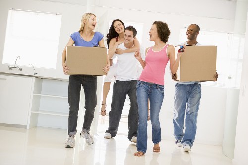 Local moving truck service handling boxes and furniture near Catford flats