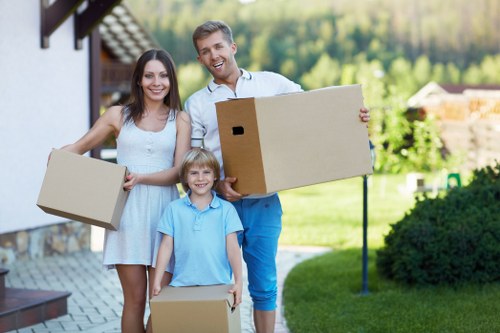 Professional movers assisting with a home relocation in Catford