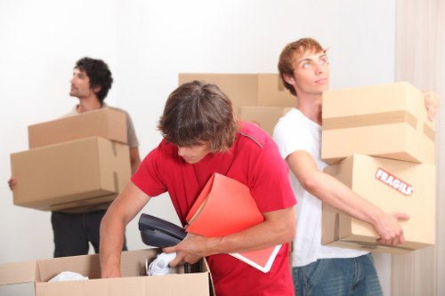 Loading household items into a moving van in Catford
