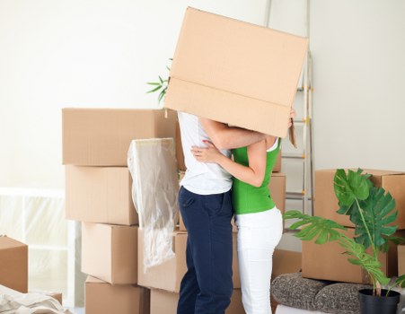 Packing and loading furniture into a moving truck in Catford