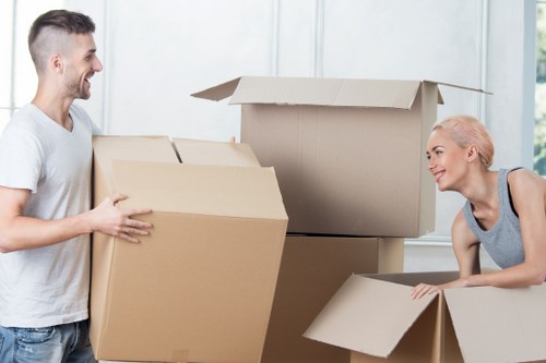 Loading household items into a van for a Catford move
