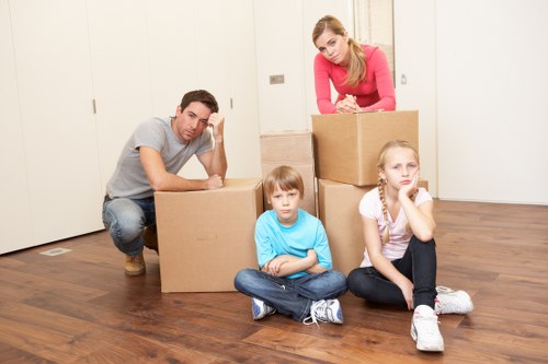 Catford removals van helping with household furniture and boxes