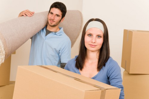 Moving boxes and household items ready for transport in Catford
