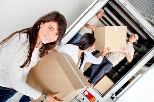 Local removals team preparing a van for a Catford move