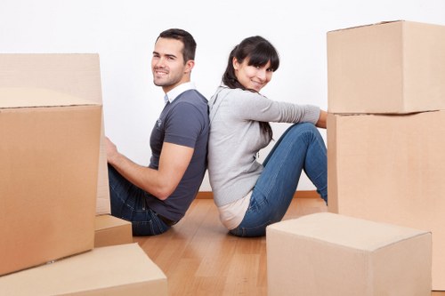 Packed moving boxes and furniture ready for local removals